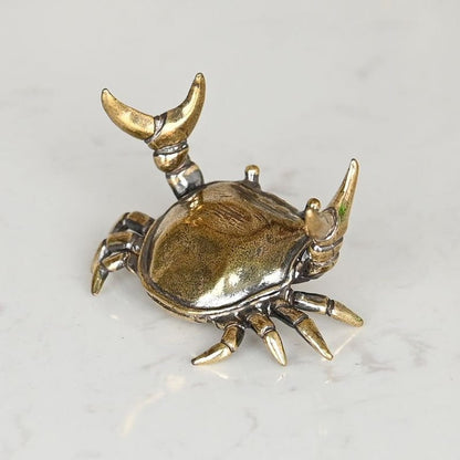 Brass weightlifting crab